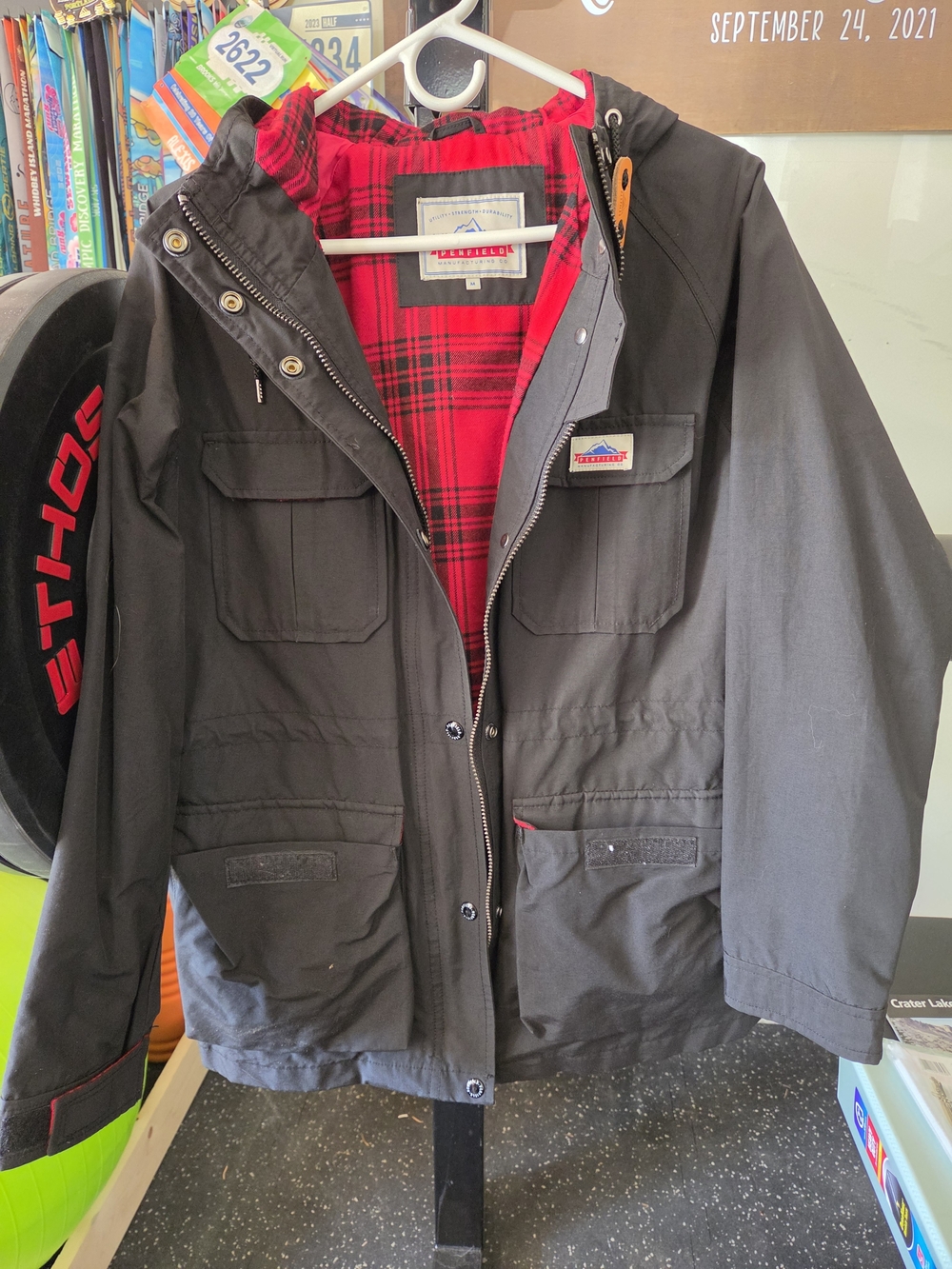 Penfield Black Women's Hooded Jacket with Red Plaid Lining